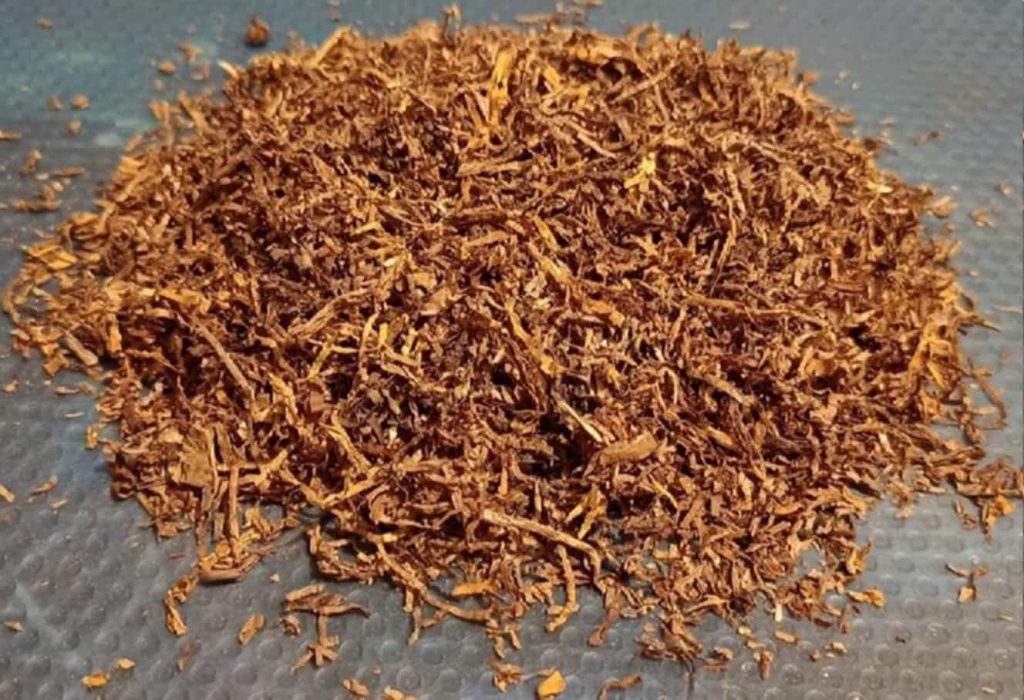 Close-up of cut rag tobacco blend in production